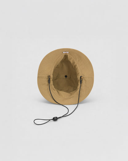 BURTER PACKABLE TECH BUCKET HAT BEIGE 