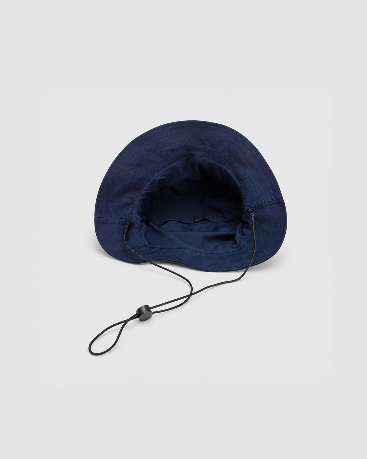 BURTER PACKABLE TECH BUCKET HAT NAVY 
